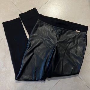 Calvin Klein stretch pants with Faux leather front.